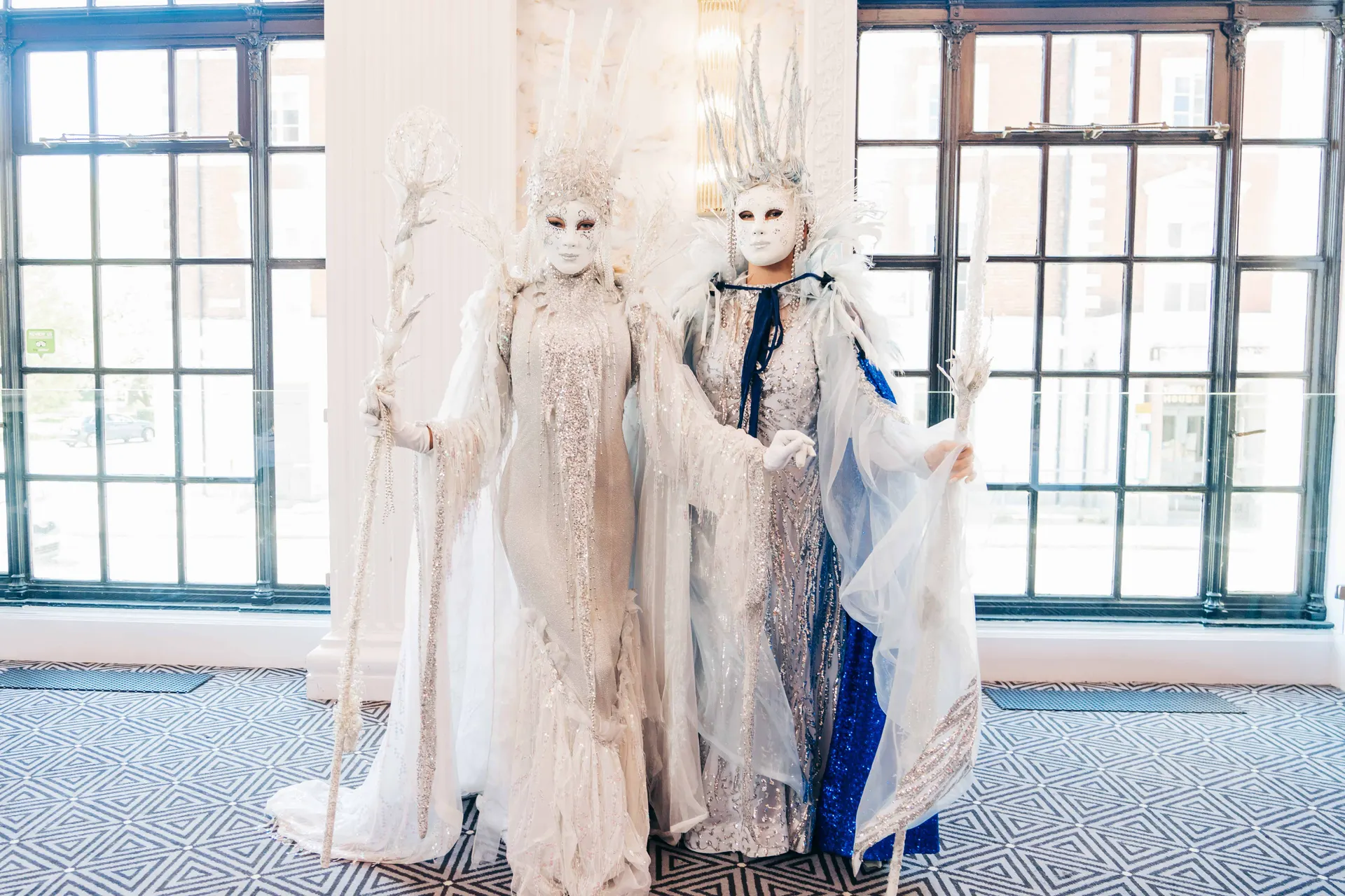 Pair: living statues, winter wonderland theme